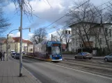 Rostock Straßenbahnlinie 5 mit Niederflurgelenkwagen 687 auf Rosa-Luxemburg-Straße (2015)