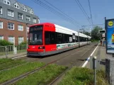 Bremen Straßenbahnlinie 6 mit Niederflurgelenkwagen 3119 am Berufsbildungswerk (2021)