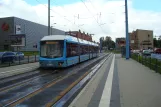Chemnitz Straßenbahnlinie 1 mit Niederflurgelenkwagen 610 am Industrie-museum (2015)