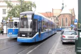 Krakau Straßenbahnlinie 18 mit Gelenkwagen 183 auf Plac Wszystkich Świętych (2011)
