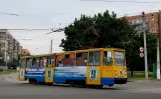 Kramatorsk Straßenbahnlinie 3 mit Triebwagen 0056 in der Kreuzung Dnipropetrovska Street/Ordzhonikidze Street (2012)