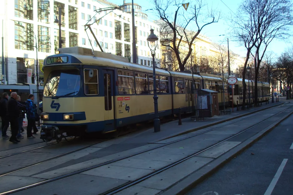 Wien Regionallinie 515 - Badner Bahn mit Gelenkwagen 4-115 "Andreas" am Oper (2014)