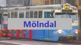 Bahnhof Mölndal mit Straßenbahnen und Zügen